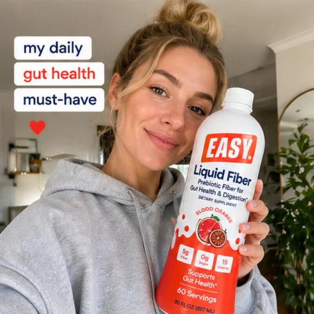 Woman holding Easy Fiber bottle