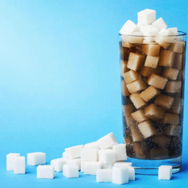 Glass full of sugar cubes